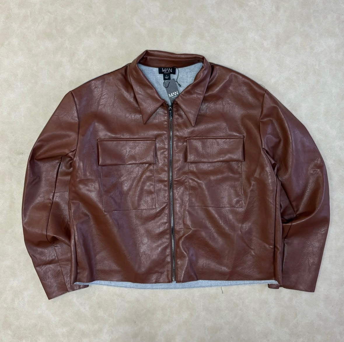 Boxy Collared PU Harrington Jacket With
Raw Edge In Brown