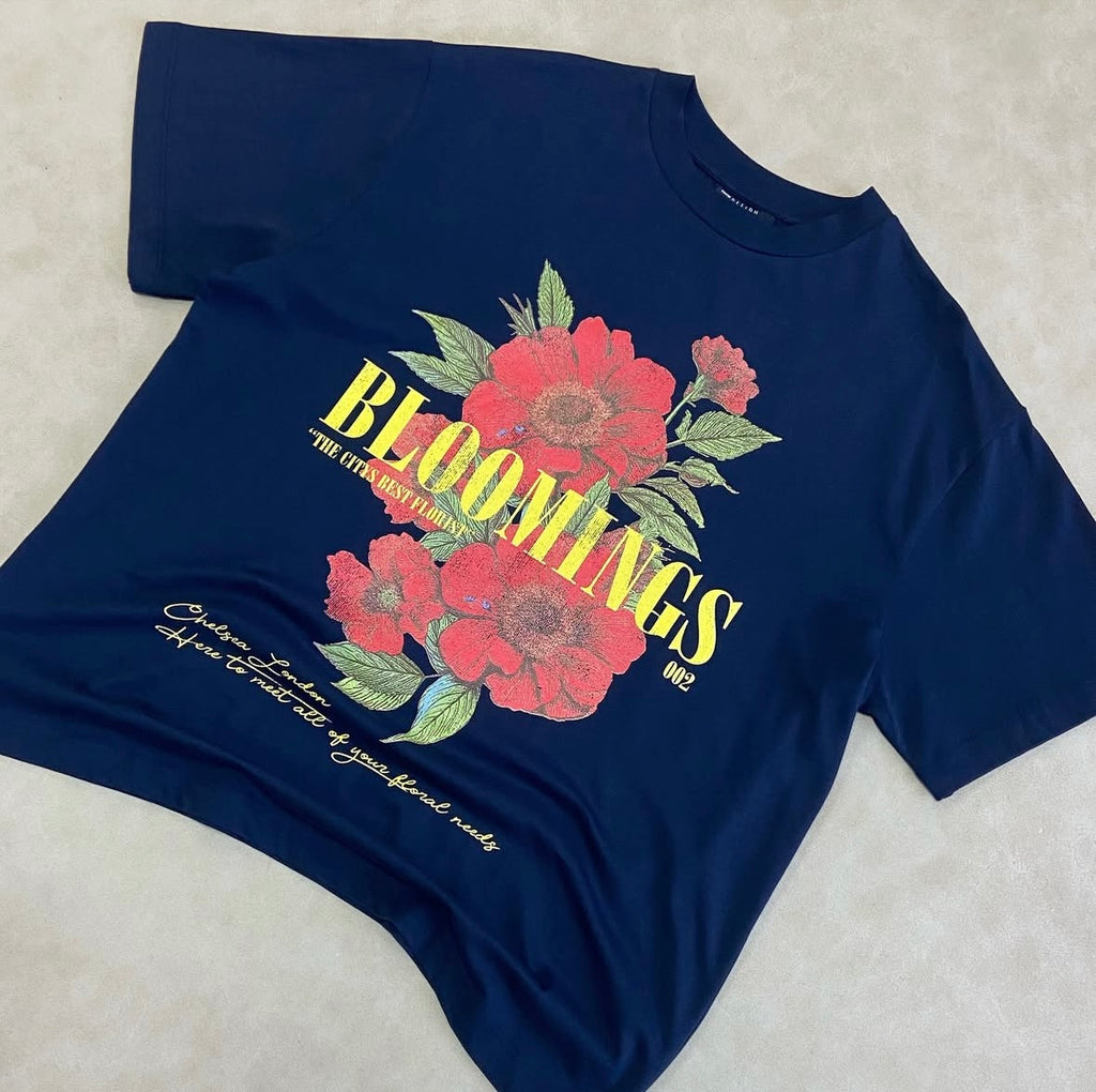 ASOS DESIGN oversized t-shirt with blooming floral graphic in navy
