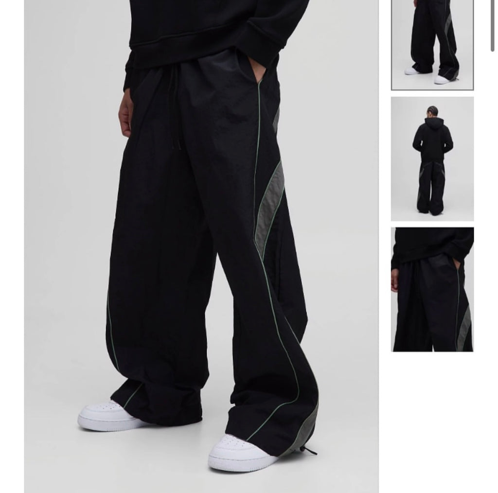 Elasticated Waist Piping Detail Parachute
Pants