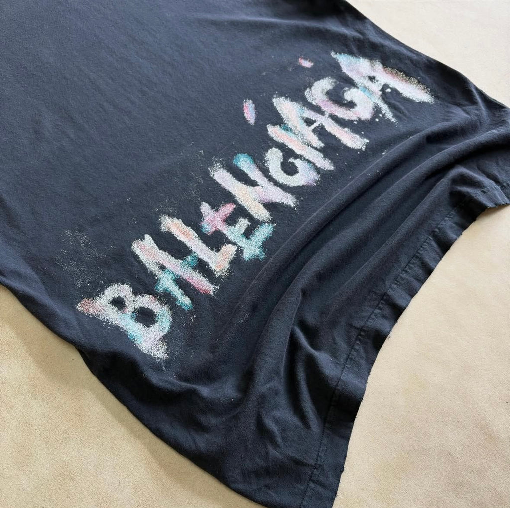 BALENCIAGA NAIL POLISH T-SHIRT
MEDIUM FIT IN FADED BLACK