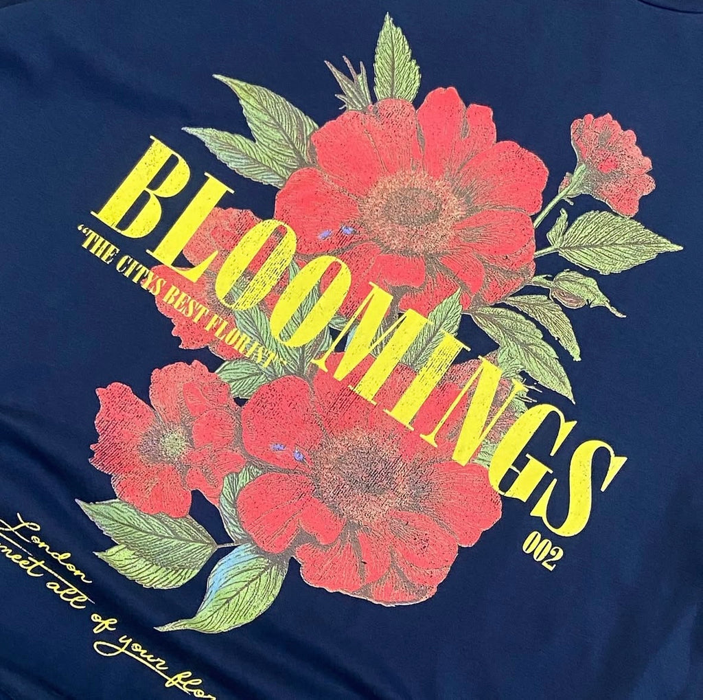 ASOS DESIGN oversized t-shirt with blooming floral graphic in navy