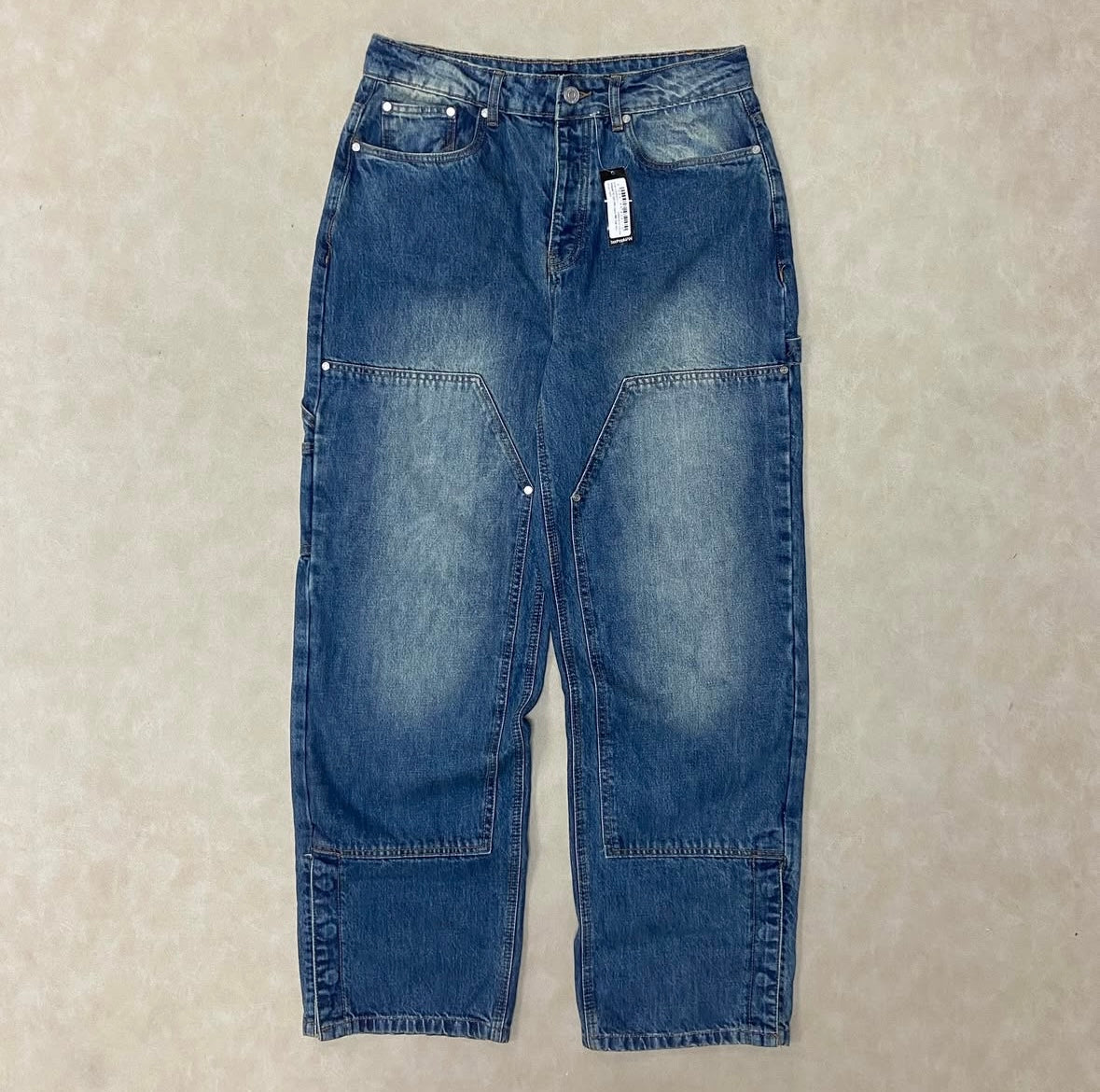 Relaxed Fit Carpenter Jeans With Split
Hem