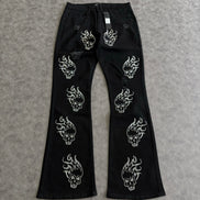 Skulls Jeweled Distressed Stacked Flare Pants