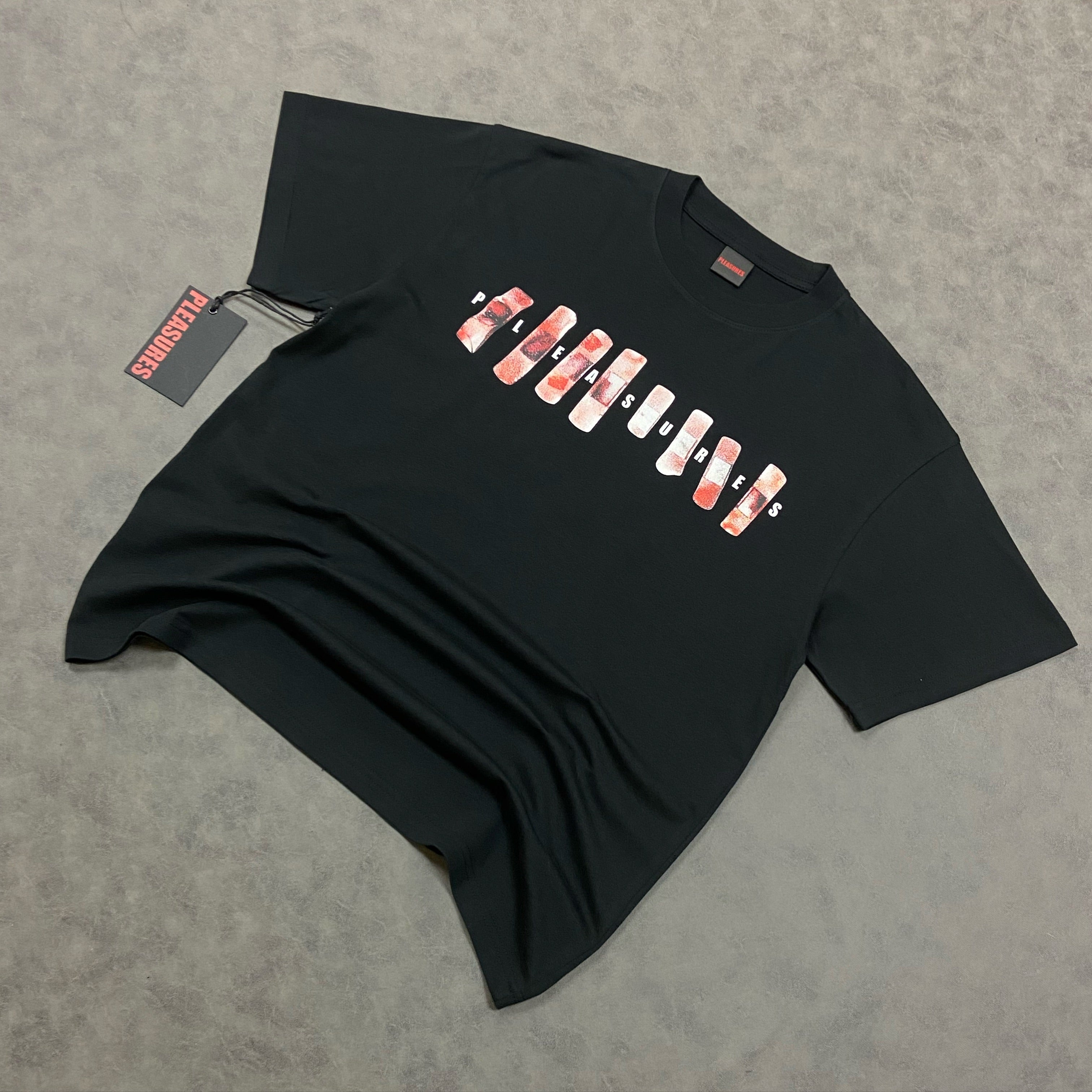 PLEASURES T-PAITA PLEASURES WOUNDED T-SHIRT