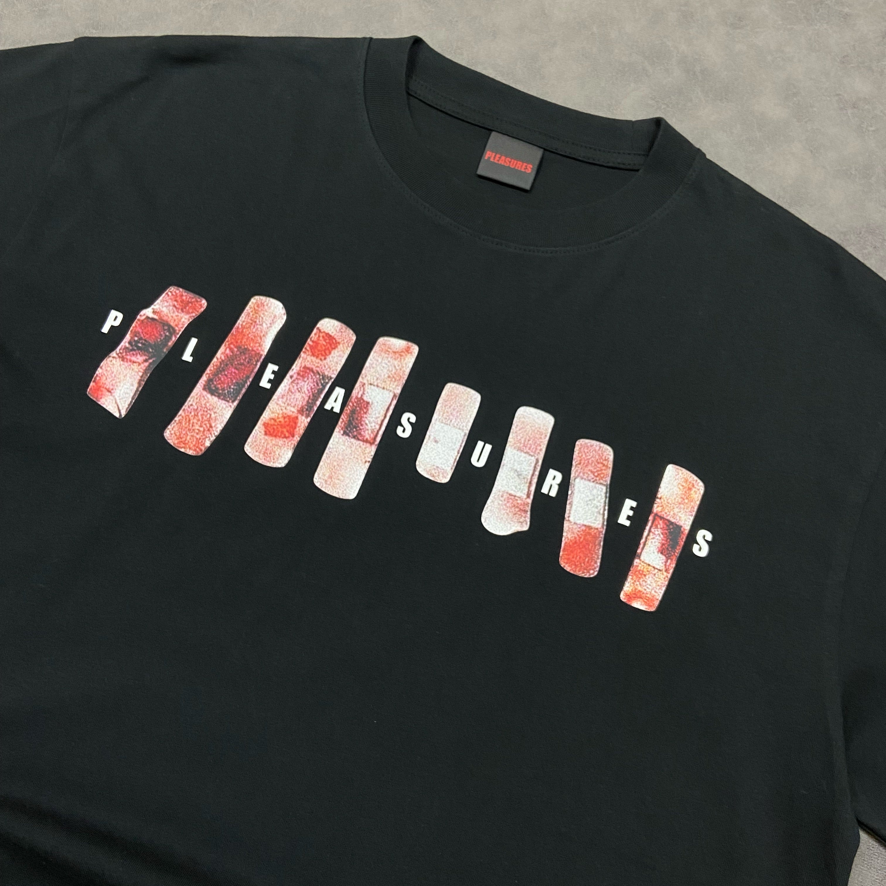 PLEASURES T-PAITA PLEASURES WOUNDED T-SHIRT