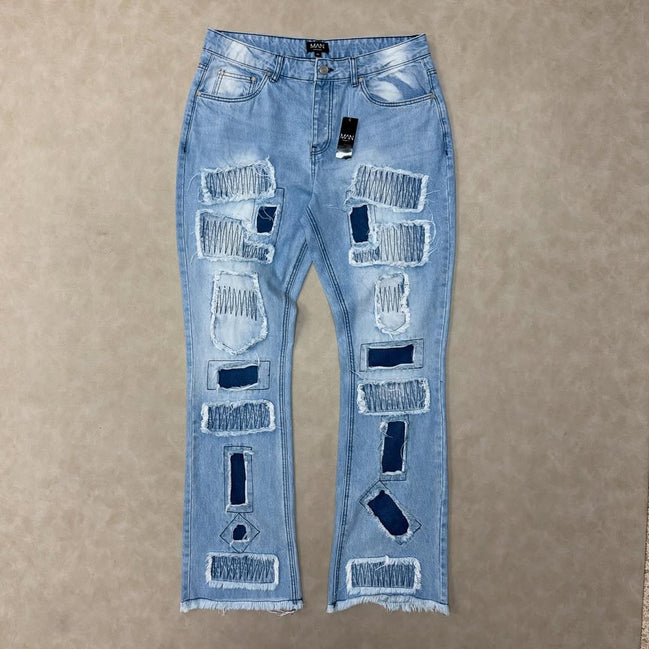 Slim Flared Stacked Rip & Repair Stitch Jeans