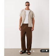ASOS DESIGN loose textured trousers in brown with elastic waistband