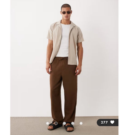 ASOS DESIGN loose textured trousers in brown with elastic waistband