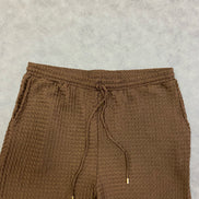 ASOS DESIGN loose textured trousers in brown with elastic waistband