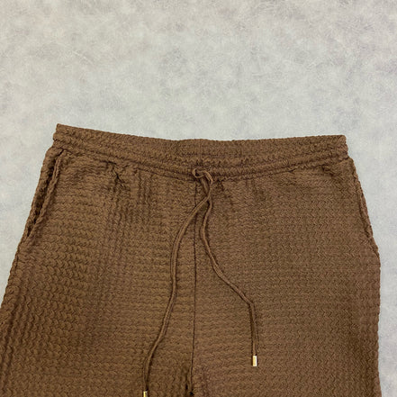 ASOS DESIGN loose textured trousers in brown with elastic waistband