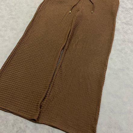 ASOS DESIGN loose textured trousers in brown with elastic waistband