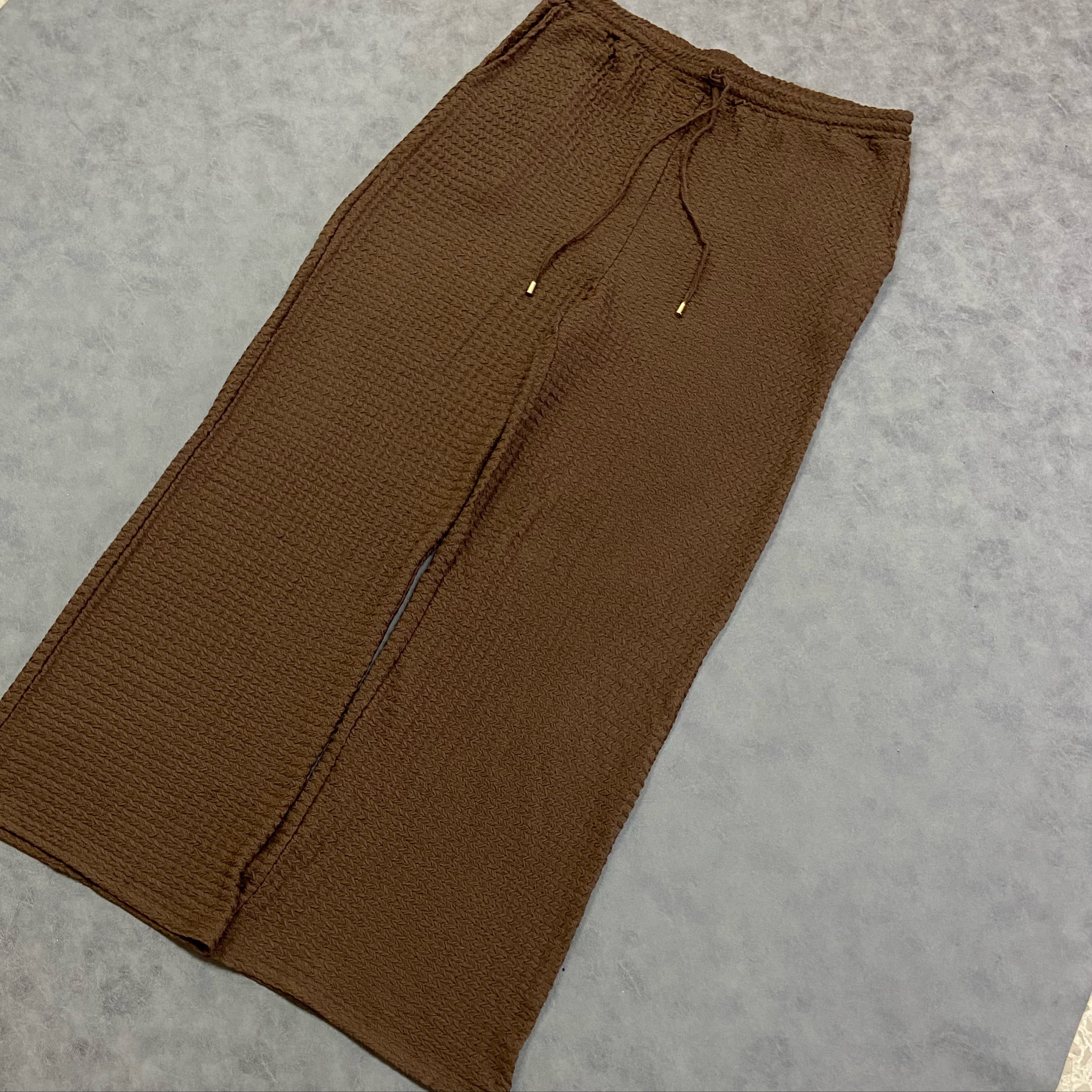 ASOS DESIGN loose textured trousers in brown with elastic waistband