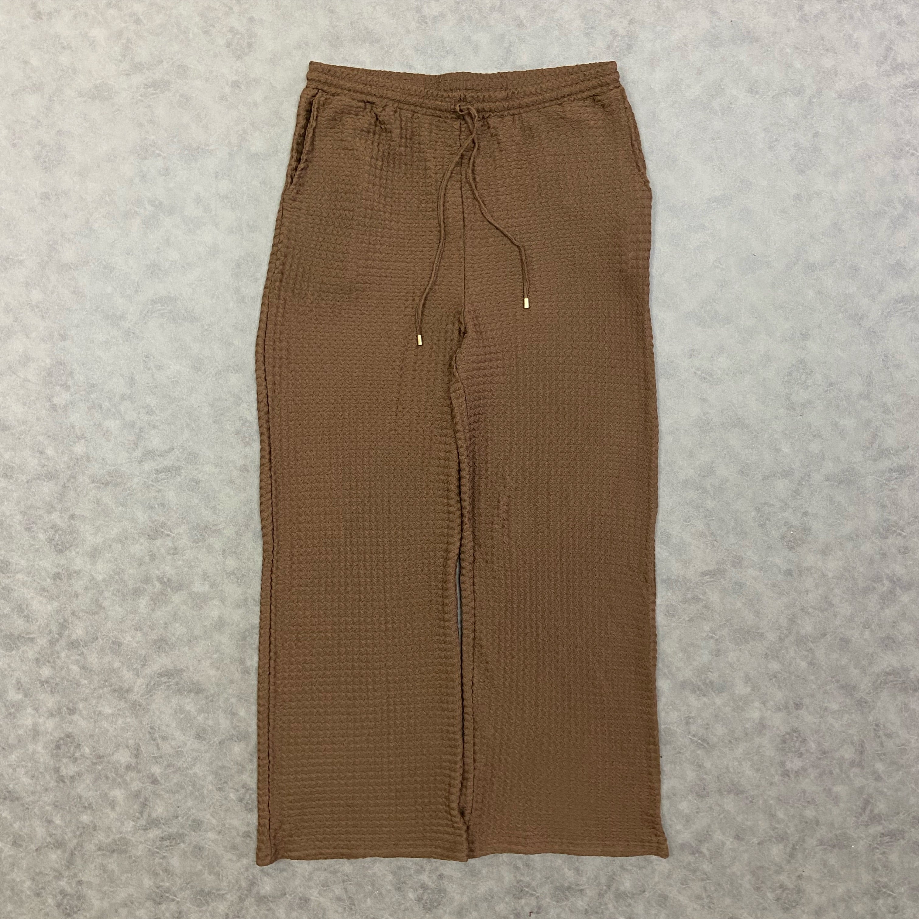 ASOS DESIGN loose textured trousers in brown with elastic waistband