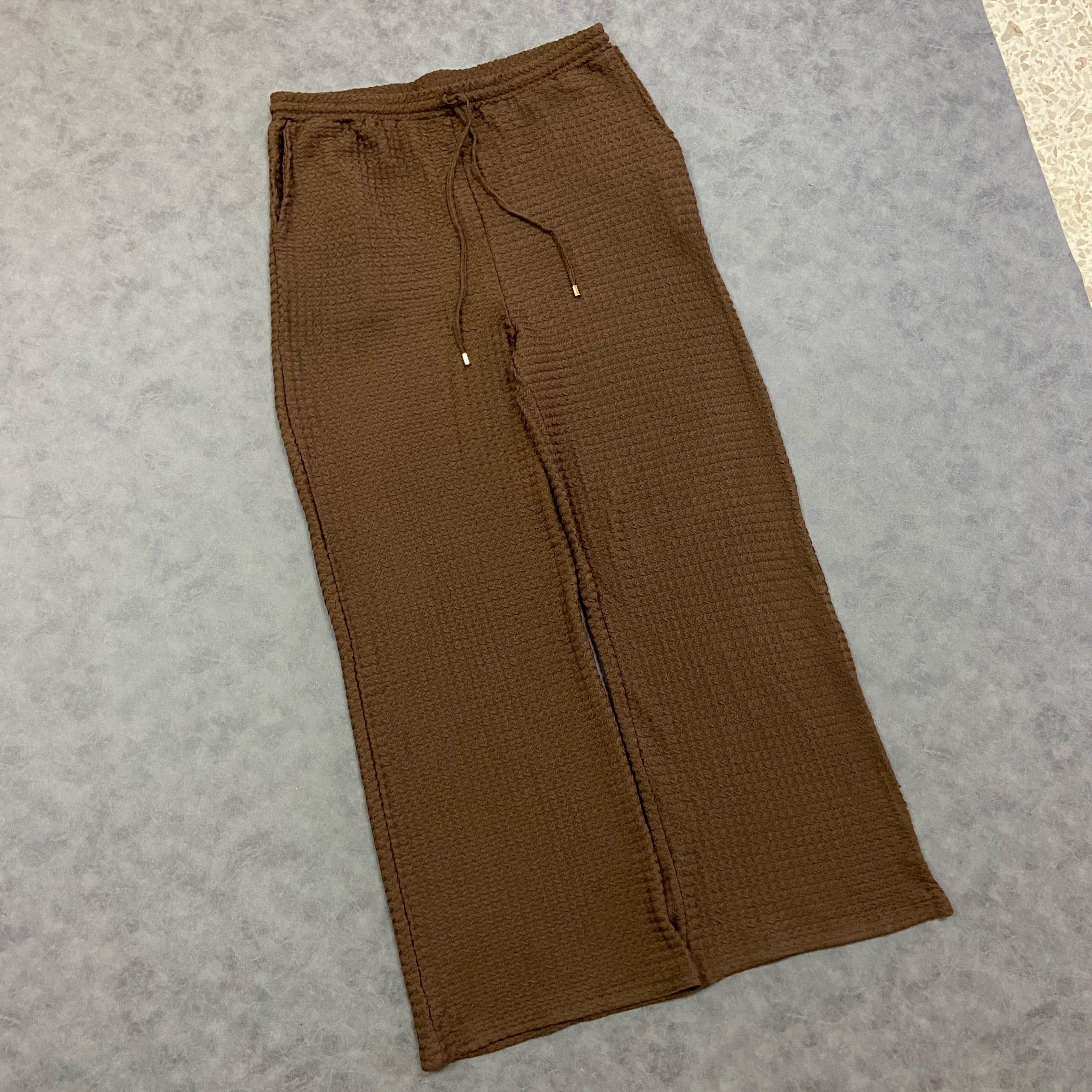 ASOS DESIGN loose textured trousers in brown with elastic waistband